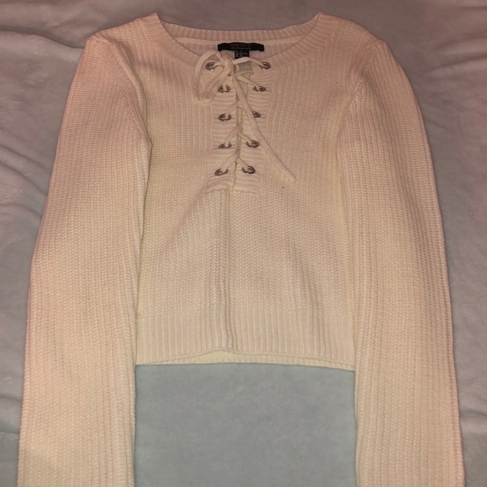 Medium cream knit sweater with lace up front